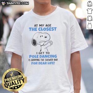 Funny Peanuts Snoopy t-shirt featuring a humorous quote about aging and shower bar gripping, perfect for laughs.