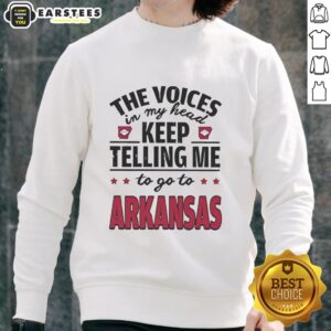 Funny sweatshirt featuring 'The voices in my head keep telling me to go to Arkansas' design, perfect for casual wear.