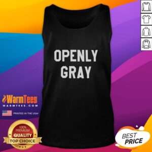 Adrianne Curry in a stylish gray tank top, showcasing her unique fashion sense and confidence.