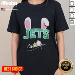 Alt Text: Official New York Jets x Snoopy Happy Easter 2-sided ladies tee featuring vibrant graphics and festive design.