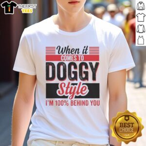 Alt Text: Retro t-shirt featuring the phrase When It Comes To Doggy Style I'M 100 Percent Behind You in bold letters.