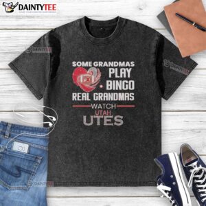 Grandmas playing bingo in Utah Utes washed t-shirts, showcasing fun and team spirit in a vibrant community gathering.