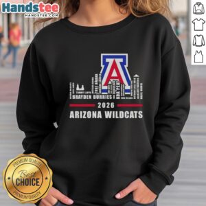 Alt Text: Top 2026 Arizona Wildcats logo sweatshirt featuring city skyline and team names in vibrant colors.