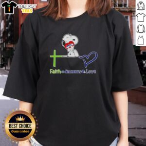 Premium Seattle Seahawks Snoopy hugs heart design on a ladies tee, perfect for Seahawks fans showing love and faith.