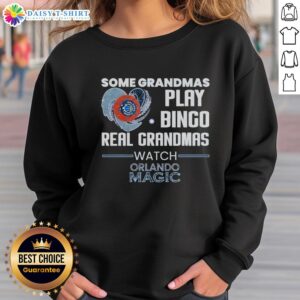 Cozy 'Some Grandmas Play Bingo, Real Grandmas Watch Orlando Magic' sweatshirt featuring vibrant colors and a fun design.