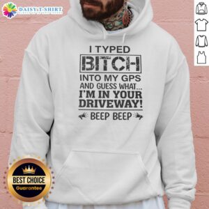 Alt Text: Person wearing 'Top I Typed B*tch Into My GPS' hoodie, standing in a driveway, showcasing trendy streetwear style.