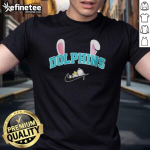 Miami Dolphins X Snoopy Happy Easter T-Shirt featuring vibrant graphics for a festive and sporty celebration.