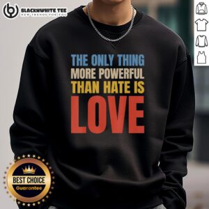 Vintage sweatshirt featuring 'The Only Thing More Powerful Than Hate Is Love' design, perfect for spreading positivity.