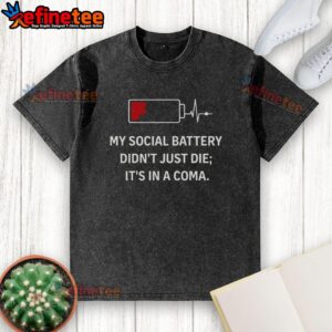 Alt Text: Official My Social Battery Didn't Just Die It's In A Coma washed t-shirt design with humorous graphic.