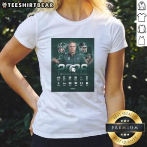 Alt Text: Michigan State Spartans football NCAA 2026 regular season schedule poster on a ladies tee shirt design.