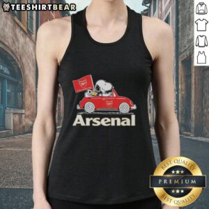 Alt Text: Snoopy and Woodstock joyfully drive an Arsenal red car while raising a flag, showcasing their playful adventure in style.