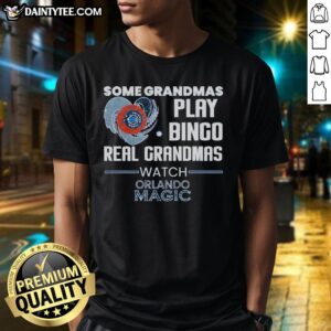 Alt Text: Premium Some Grandmas Play Bingo, Real Grandmas Watch Orlando Magic T-Shirt design featuring bold graphics and vibrant colors.