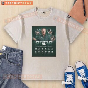 2026 NCAA Michigan State Spartans football regular season schedule poster on a washed t-shirt, showcasing team pride.