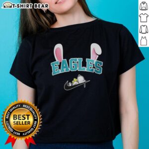 Pretty Philadelphia Eagles X Snoopy Happy Easter ladies tee featuring festive designs for football fans.