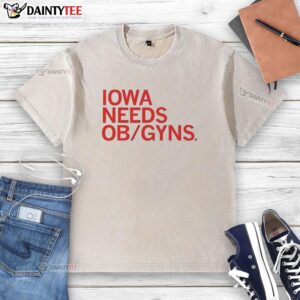 Good Iowa Needs OB GYNs washed t-shirt featuring a bold graphic design highlighting the importance of OB GYN professionals.