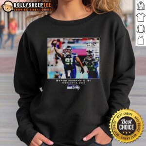 Byron Murphy II wearing a Seattle Seahawks sweatshirt, showcasing his NFL style in 2026.
