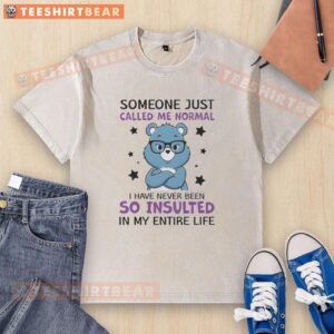 Awesome blue bear graphic on a washed t-shirt with the text 'Someone just called me normal!' for a fun, casual look.