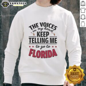 Funny sweatshirt featuring 'The Voices In My Head Keep Telling Me To Go To Florida' design, perfect for casual wear.