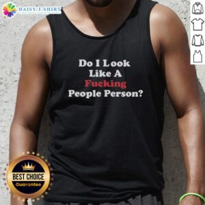 Alt Text: Woman wearing an Do I Look Like A Fucking People Person tank top, showcasing a bold graphic design and casual style.