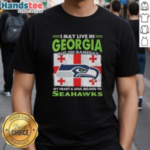 Alt Text: Official Seattle Seahawks I May Live In Georgia But On Gameday My Heart And Soul Belong To Seahawks T-Shirt design.