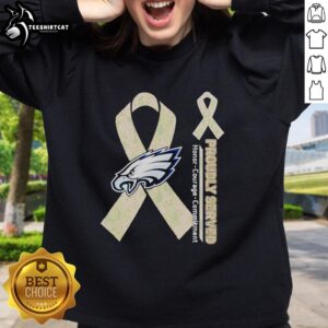 Premium Philadelphia Eagles sweatshirt showcasing honor, courage, and commitment in bold team colors.