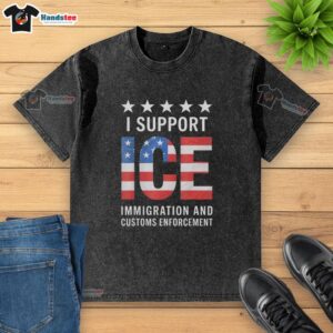 Alt Text: Patriotic washed t-shirt featuring 'I Support Ice' with USA flag design, perfect for American pride and ice enthusiasts.