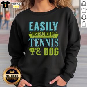 Funny Easily Distracted By Tennis Dog Sweatshirt featuring a playful dog with a tennis ball design, perfect for dog lovers.