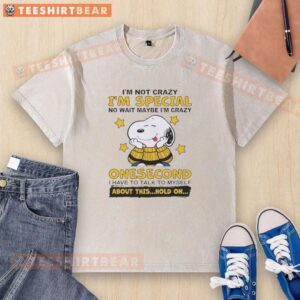 Cute Peanuts Snoopy t-shirt with 'I'm not crazy, I'm just special' slogan, perfect for fans of whimsical apparel.