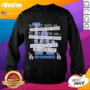 Alt Text: Cozy sweatshirt featuring Nice Go Los Angeles Dodgers design, perfect for fans to showcase their team spirit.