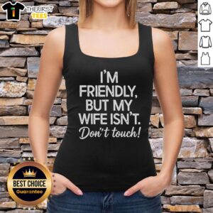 Funny tank top featuring 'I'm Friendly But My Wife Isn't' design, perfect for casual outings and humorous gifts.