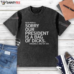 Alt Text: Humorous 'Hot Dear World' T-shirt design expressing frustration with US leadership'A Bag of Dicks' graphic.