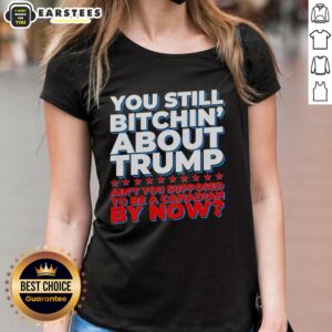 Awesome ladies tee with 'Still Bitchin About Trump' slogan, perfect for Canadian humor and political commentary.