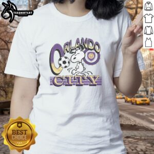 Alt Text: Premium Peanuts Snoopy X Orlando City ladies tee featuring vibrant design, perfect for fans and casual wear.