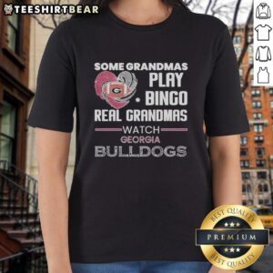 Grandmas enjoying a game of bingo while wearing Georgia Bulldogs ladies tee, celebrating their love for football.