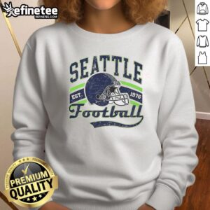 Retro Seattle Seahawks Super Bowl LX sweatshirt featuring 1976 helmet design, perfect for fans and collectors.