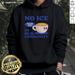 Cozy hoodie featuring 'Fuck Ice In Our Community' design, perfect for coffee lovers who embrace warmth and style.