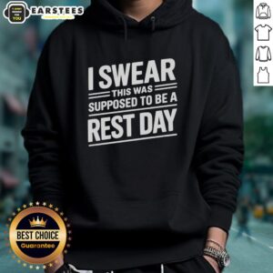 Funny 'I Swear This Was Supposed to Be a Rest Day' Text Hoodie in casual setting, perfect for humorous relaxation wear.