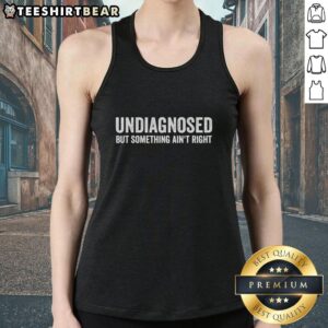 Funny tank top featuring the phrase Nice, Undiagnosed, But Something Ain't Right for a humorous fashion statement.