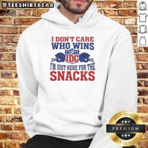 Alt Text: Good IDC I Don't Care Who Wins I'm Just Here for the Snacks Hoodie in a cozy setting, perfect for game day snacks.