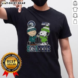 Seattle Seahawks Charlie Brown and Snoopy T-shirt featuring a vibrant Seattle Washington design, perfect for fans.
