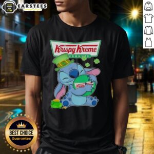 Alt Text: Cute Stitch hugging the Krispy Kreme logo on a Happy St. Patrick's Day T-shirt, perfect for festive celebrations.