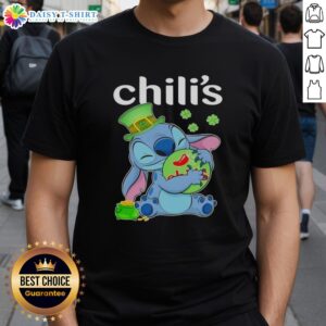 Alt Text: Cute Stitch hugging the Chili's logo on a Happy Patrick's Day T-shirt, perfect for festive celebrations.
