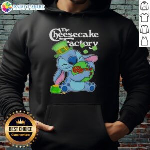 Alt Text: Cute Stitch hugging The Cheesecake Factory logo on a Happy St. Patrick's Day hoodie, perfect for festive celebrations.