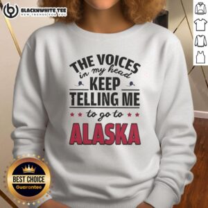 Awesome sweatshirt featuring the phrase 'The Voices In My Head Keep Telling Me To Go To Alaska' for cozy style.