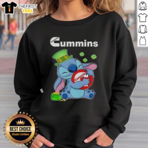 Alt Text: Cozy St. Patrick's Day sweatshirt featuring Nice Stitch with Cummins logo, perfect for festive celebrations.