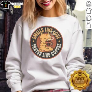 Cozy sweatshirt featuring the phrase 'Good Smells Like Love, Taste Like Coffee' for coffee lovers and gift seekers.