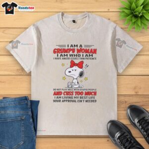 Grumpy woman graphic t-shirt featuring Snoopy, expressing anger issues and thin patience, perfect for casual wear.
