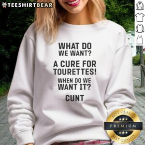 Hot sweatshirt featuring 'What Do We Want? A Cure for Tourettes!' slogan - perfect for raising awareness and showing support.