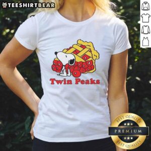 Alt Text: Official Snoopy Twin Peaks Ladies Tee featuring a colorful graphic of Snoopy against a vintage-style background.