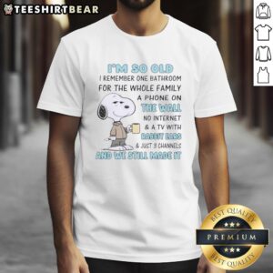 Funny Snoopy t-shirt design: 'I'm So Old I Remember One Bathroom for the Whole Family, a Phone on the Wall, No Internet.'
